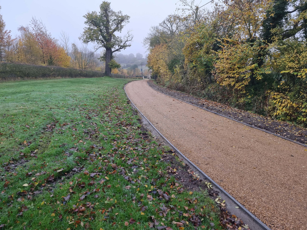 This is a large driveway which has just had a tar and chip driveway installed on by Eye Driveways